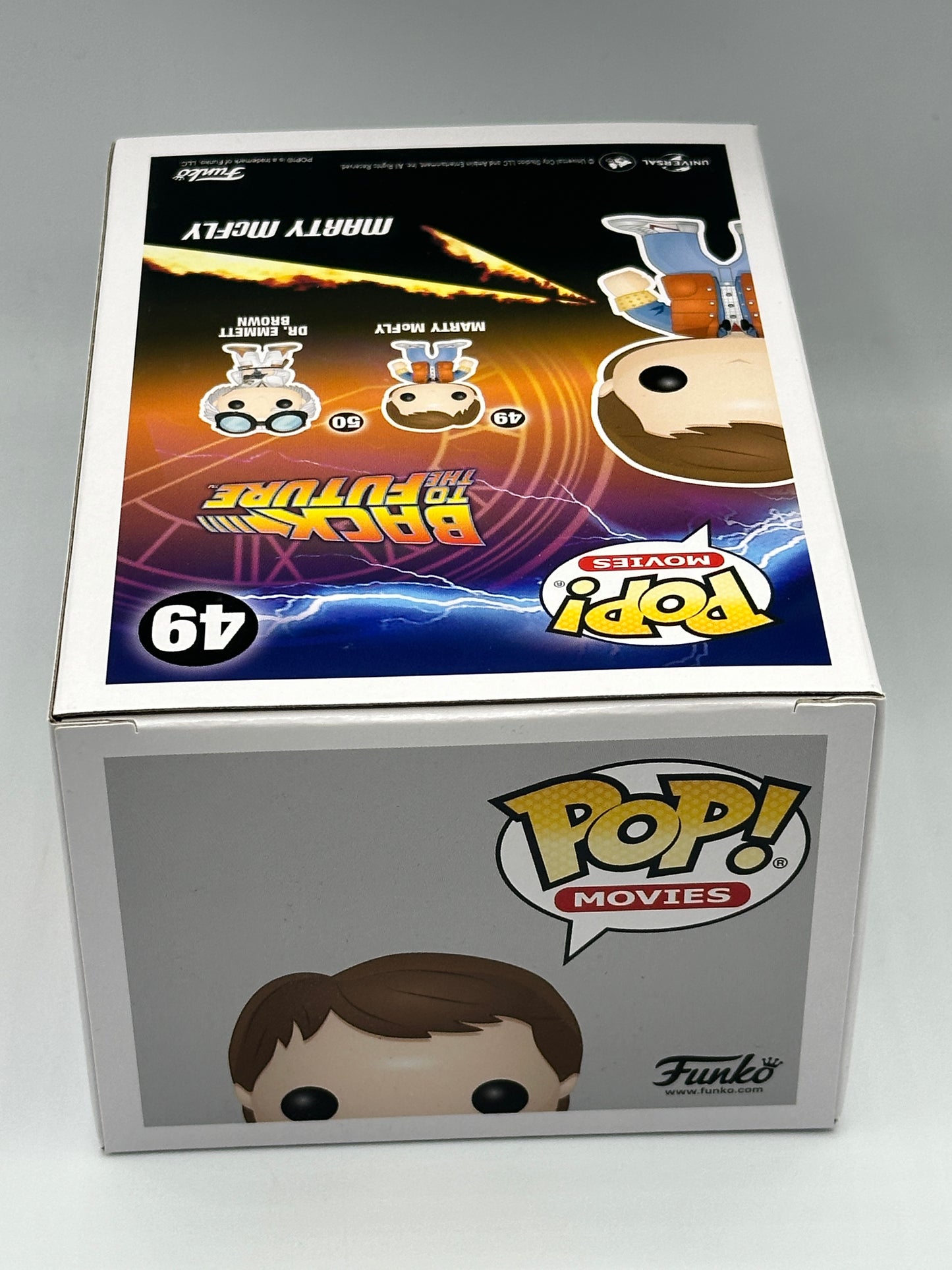 Funko Pop! Vinyl Back to the Future - 49 Marty McFly (Plutonium Glow in the Dark Convention Exclusive) With Special Magentic Hardstack only 3000 PCS in the world
